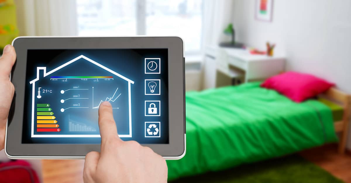 male hand adjusting smart home settings on tablet